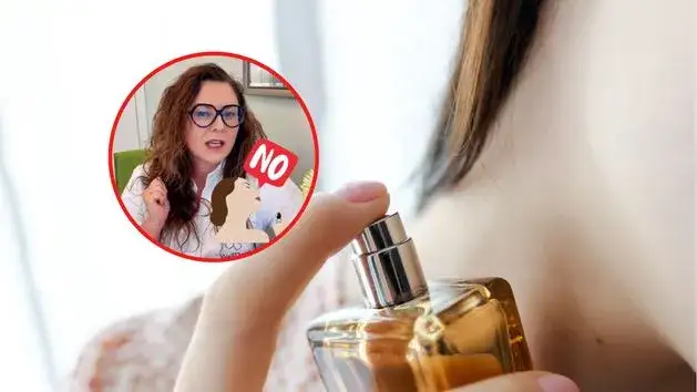 Kobieta aplikująca perfumy na szyję
